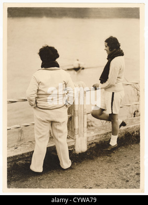 Vintage press photograph - women beside the River Thames wearing rowing clothes dated 17 December 1932, Chiswick, London, U.K. Stock Photo