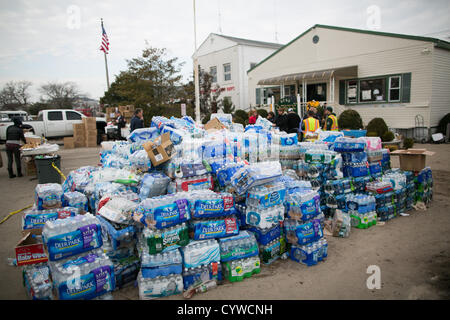 Nov. 10, 2012 - Breezy Point, New York - A mountain of donated water in Breezy Point, New York on Saturday November 10, 2012 nearly two weeks after Hurricane Sandy devastated the area. (Credit Image: © Nicolaus Czarnecki/ZUMAPRESS.com) Stock Photo