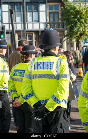 Police wearing high-visibility jackets on duty at a road traffic ...