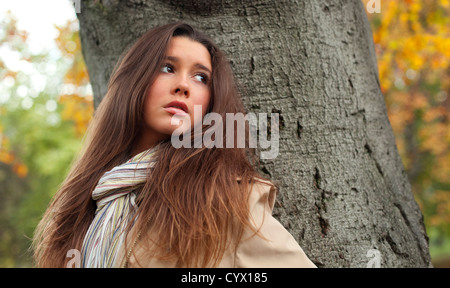 Portrait of a beautiful, young woman looking away, Green Park, London, England, UK Stock Photo