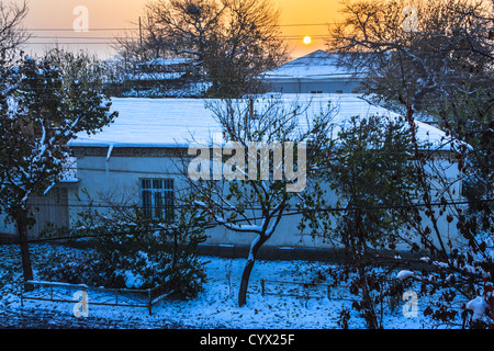 Sunrise over snowcapped old town in Tashkent, Uzbekistan Stock Photo