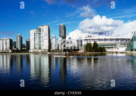 Vancouver Downtown City Skyline, British Columbia, Canada - BC Place Stadium and High Rise Condominium Buildings at False Creek Stock Photo