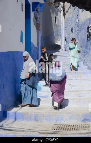 People in Chefchaouen's medina, Morocco Stock Photo