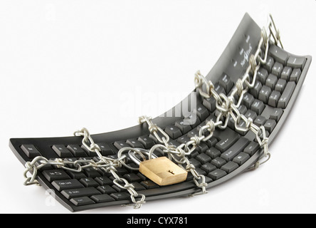 Computer keyboard locked with chain and padlock Stock Photo