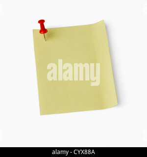 Thumbtack on an adhesive note Stock Photo