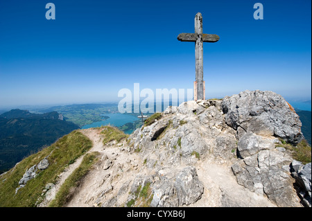 Cross on the top of the 1784 meters high mountain Schafberg in Austria Stock Photo