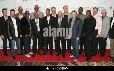 Jim Palmer, Robin Yount, Julius Erving, Kenny Leon, George Gervin, Jeffrey Osborne, Andre Reed, Rollie Fingers, Reggie Jackson, Rick Barry, Jeremy Roenick, Brian McKnight, Dave Stewart, Roger Clemens, Joe Rudi, Franco Harris at arrivals for 8th All Star Celebrity Classic to Benefit Mr. October Foundation for Kids, The Cosmopolitan of Las Vegas, Las Vegas, NV November 11, 2012. Photo By: James Atoa/Everett Collection/ALamy live news. USA. Stock Photo