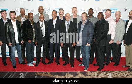 Jim Palmer, Robin Yount, Julius Erving, Kenny Leon, George Gervin, Jeffrey Osborne, Andre Reed, Rollie Fingers, Reggie Jackson, Rick Barry, Jeremy Roenick, Brian McKnight, Dave Stewart, Roger Clemens, Joe Rudi, Franco Harris at arrivals for 8th All Star Celebrity Classic to Benefit Mr. October Foundation for Kids, The Cosmopolitan of Las Vegas, Las Vegas, NV November 11, 2012. Photo By: James Atoa/Everett Collection/ALamy live news. USA. Stock Photo
