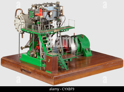 A fine and rare model twin cylinder compound vertical condensing generating set,Built by J. Nichols Gloucester 1977 from Bateman castings with blued steel clad cylinders(cylinder head lubricators missing),valve chest pressure gauge,draincocks and fine pipe work,regulator valve,counterbalanced crankshaft running in four main bearings,disc flywheel and direct coupled round frame dynamo. Other details include LP crosshead driven air pump,tubed condenser,lagged steam pipes,laddered walk ways and wooden base,finished in red,green and polished bright work,Additional-Rights-Clearences-Not Available Stock Photo