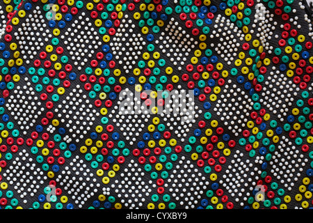 Close up of colourful beads pattern detail on beaded bag - bead abstract Stock Photo