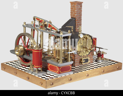 An unusual boiler and beam engine stationary steam set,Comprising a horizontal brass boiler with normal fittings,hand feed pump and water tank,main stop and lagged steam line to single cylinder six pillar beam engine,parallel motion,rod driven feed pump,fluted connecting rod,spoked flywheel and multi-rope pulley and other details,finished in maroon with yellow linlng,black and polished brightwork and mounted on a black and white tiled floor and wood base. Measures without socket: 33 x 54 cm,historic,historical,20th century,steam engine,steam engin,Additional-Rights-Clearences-Not Available Stock Photo