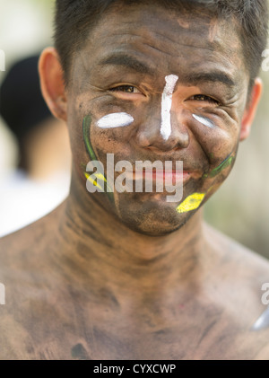 Young Okinawan man in traditional costume at Ryukyu Mura Okinawa Japan ...