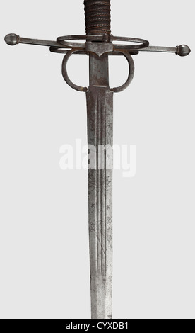 A cut & thrust sword,in the style of circa 1550,composed of old parts Double-edged blade,triple fullers on either side of the root,etched with a design of sun,moon and stars. Iron hilt with two guard rings and fig-shaped finials. Copper and iron wire bound wood grip. Long octagonal pommel. Length 117 cm,historic,historical,16th century,weapons,arms,weapon,arm,baronial,military,militaria,rapier,rapiers,sword,swords,melee weapon,melee weapons,thrusting,thrustings,baton,object,objects,stills,clipping,cut out,cut-out,cut-outs,Additional-Rights-Clearences-Not Available Stock Photo