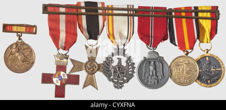 The Spanish Blue Division,the legacy of soldier Gutierrez del Castillo with letters A large five part medal bar with the following decorations: Spanish Military Service Cross,Red Division,Knightïs Cross 1st Class,War Service Cross 2nd Class without Swords,Spanish Commemorative Medal for members of the Blue Division,Eastern Winter Combat Medal,Commemorative Medal for Spanish volunteers in the Wehrmacht,and the Spanish Medalla de la Campana Espanola.The Spanish medal '1 Abril 1939 Victoria' is separate.It comes with the entire correspondence of voluntee,Additional-Rights-Clearences-Not Available Stock Photo