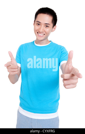 Happy young man pointing Stock Photo