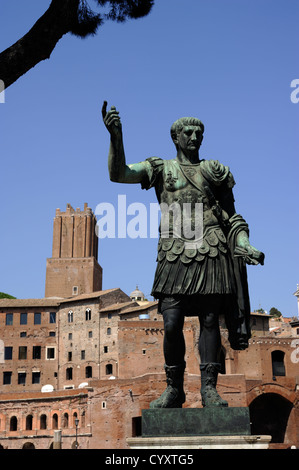 Italy, Rome, bronze statue of the emperor Trajan and Trajan's markets Stock Photo