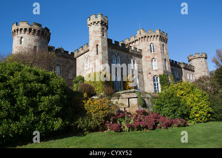 Cholmondeley Castle Gardens. Autumnal view of the north elevation of Cholmondeley Castle. Stock Photo