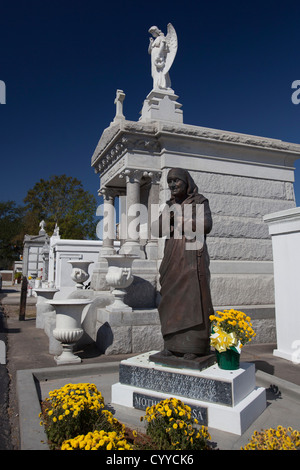 New Orleans, Louisiana - A statue of Mother Teresa in St. Louis #3 Cemetery. Stock Photo