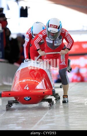 09.11.2012. Lake Placid, New York, USA.    Switzerland 1 driven by Fabienne Meyer with brakeman Andrea Bitzer on the track at the Olympic Sports Complex in Lake Placid, NY in the Women's Bobsled World Cup. Stock Photo