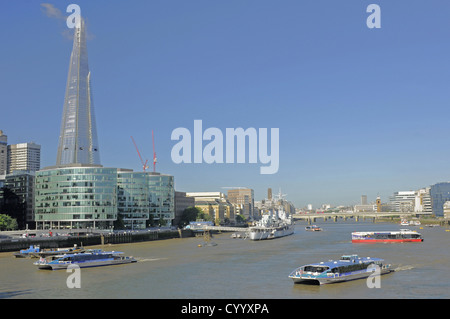 The Shard with City Hall and HMS Belfast in the foreground Travel Beal Feirste British Isles Destination Destinations Great Stock Photo