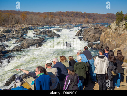 GREAT FALLS, MARYLAND, USA - People at Olmsted Island overlook view Potomac River at Great Falls. Stock Photo