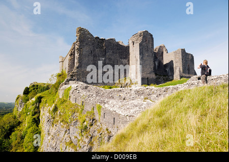 Carreg Cennen castle, near Llandeilo, Wales, UK. Brecon Beacons National Park. East front. Limestone escarpment. Late Mediaeval Stock Photo