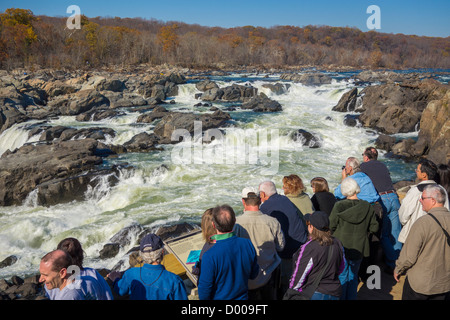 GREAT FALLS, MARYLAND, USA - People at Olmsted Island overlook view Potomac River at Great Falls. Stock Photo