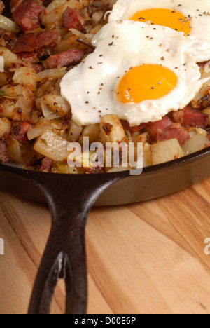 Southern breakfast of corned beef hash with a sunnyside up egg Stock Photo