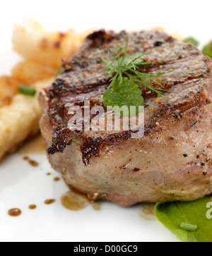 Bacon Wrapped Beef Fillet With Vegetables And Spices Stock Photo