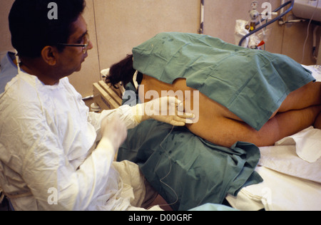 Epidural Pregnant Woman Being Given Epidural Stock Photo