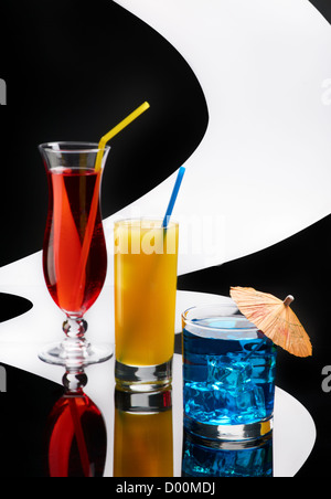 Three cocktails on conceptual background Stock Photo