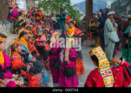 Kalash women and girls at the Grum Village Charso (dancing ground), Kalash Joshi (Spring Festival), Rumbur Valley, Chitral, Khyber-Pakhtunkhwa, Pakistan Stock Photo