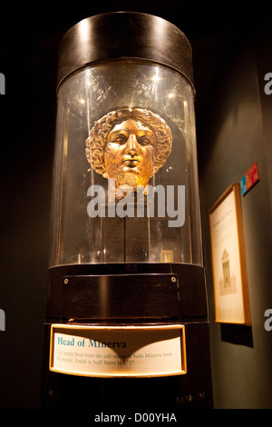 The roman 4th century gilt bronze head of Minerva in the museum, The Roman Baths Bath Somerset UK Stock Photo