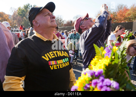 Veteran looking for names on the Vietnam War Memorial - Washington, DC Stock Photo