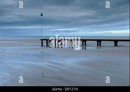 The wooden walkway on Seascale beach, Cumbria, UK. Stock Photo