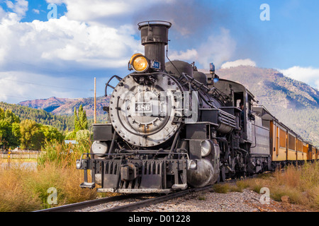 1925 Baldwin Steam Locomotive, 2-8-2 configuration, Mikado type, pulling historic classic railcars at Trimble Crossing Stock Photo