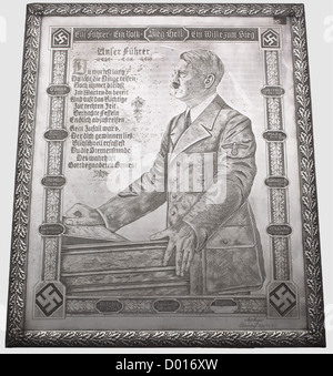 Adolf Hitler - a large, engraved homage panel from the Berndorf Metalware Factory 1940/41, Rectangular, hard silver-plated tablet with an oak leaf décor in relief on a raised edge. The centre with a masterfully engraved depiction of Adolf Hitler in party uniform, wearing an Iron Cross and Party Badge, at a speaker's lectern, with the poem 'Unser Führer' by Heinrich Anacker in the upper left corner. The depiction framed by an oak leaf border with the heading 'Ein Führer - Ein Volk - Ein Wille zum Sieg - Sieg Heil' with swastikas in the corners and continuous car, Stock Photo
