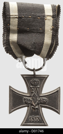 An Iron Cross of 1813,2nd Class,variant with solid one-piece silver frame and inset iron plates(?). Weight 20.68 g(without ring),39 x 39 mm,edge thickness 3 mm. Large suspension ring with a long,old ribbon section,split in places. With an expert opinion by D. Niemann. Included is a correspondence consisting of 57 letters(bound in cover)written by Leutnant Schiebler to his father regarding the 1813/14 campaign(26 January 1813 to 22 June 1814)from the Kaiser Franz Grenadier Regiment,formerly the Pomeranian Grenadier Battalion,with a handwritten rank ,Additional-Rights-Clearences-Not Available Stock Photo