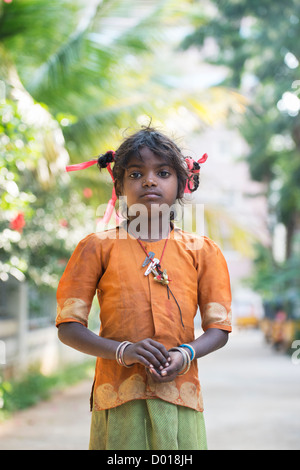 Poor Indian beggar girl. Andhra Pradesh, India. Selective focus. Stock Photo