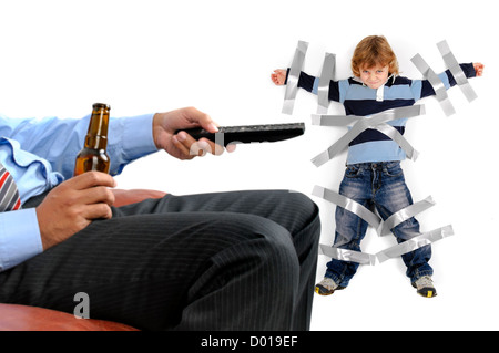 Young boy glued to the wall with duct tape, so daddy can relax and have a beer Stock Photo