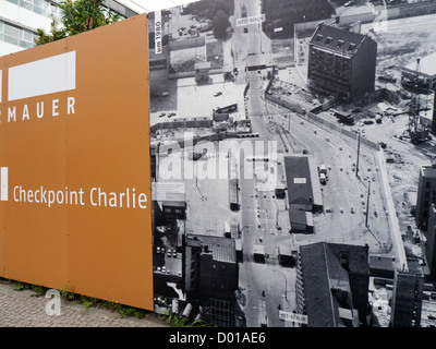 A display on the site of Checkpoint Charlie showing the former border crossing between east and west Berlin Germany Stock Photo