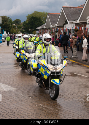 Olympic torch relay Lymington Hampshire England UK - metropolitan police motorcycle riders riding onto the Wightlink car ferry Stock Photo