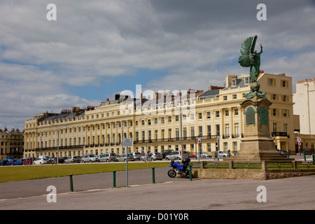 The Peace Statue and Brunswick Terrace - a regency style terrace on the seafront in Hove, East Sussex, England UK Stock Photo