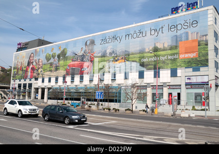 Massive advertising billboard on the side of a building in Bratislava, Slovakia. Stock Photo