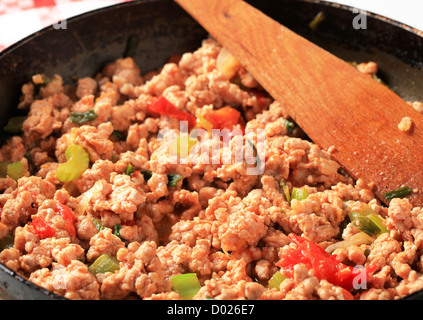 Detail of ground meat stir fry in a pan Stock Photo