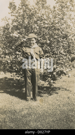 Boy Scout saluting, Scout salute to statue of Lord Baden Powell Stock ...