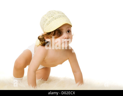 Baby girl wearing hat sitting isolated on white Stock Photo