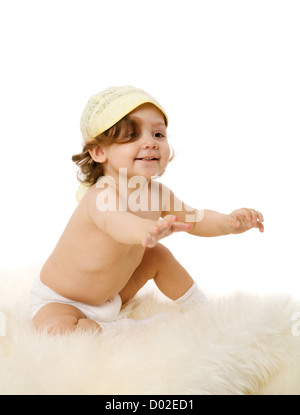 Baby girl wearing hat sitting isolated on white Stock Photo