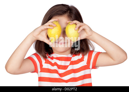 Brunette little girl with two lemons isolated on a over white background Stock Photo