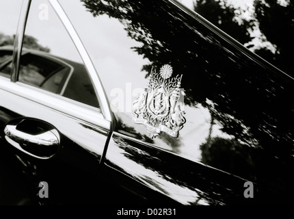 Cambodian royal crest on the car of the King in Phnom Penh Cambodia in Far East Southeast Asia. Monarch Cars Motif Logo Royalty Insignia Art Travel Stock Photo